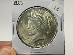 lot 12 image: 1923 Peace Silver Dollar