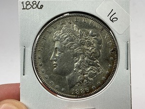 lot 16 image: 1886 Morgan Silver Dollar