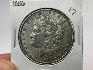 lot 17 image: 1886 Morgan Silver Dollar
