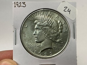 lot 24 image: 1923 Peace Silver Dollar