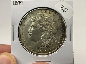 lot 28 image: 1879 Morgan Silver Dollar