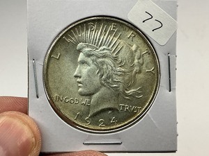 lot 77 image: 1924 Silver Peace Dollar  1 of 24 Coin in Complete Set