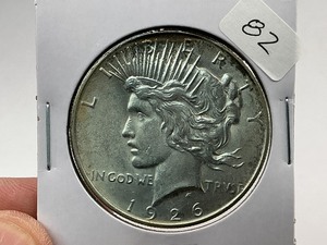 lot 82 image: 1926-D Silver Peace Dollar  1 of 24 Coin in Complete Set