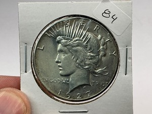 lot 84 image: 1927 Silver Peace Dollar  1 of 24 Coin in Complete Set
