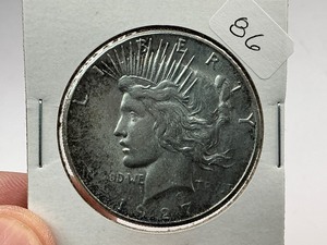 lot 86 image: 1927-S Silver Peace Dollar  1 of 24 Coin in Complete Set