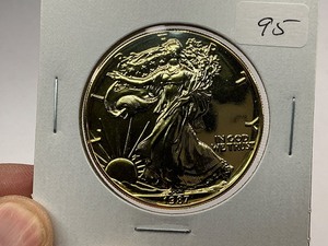 lot 95 image: 1987 24k Gold Plated American Silver Eagle