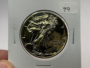 lot 99 image: 1991 24k Gold Plated American Silver Eagle