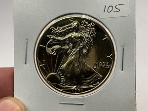 lot 105 image: 1997 24k Gold Plated American Silver Eagle