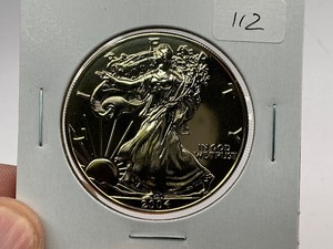 lot 112 image: 2004 24k Gold Plated American Silver Eagle