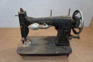 lot 79 image: Antique White Rotary Sewing Machine