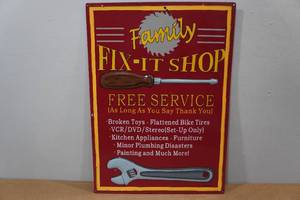 lot 118 image: Novelty Raised Metal Sign - Family Fix-It Shop