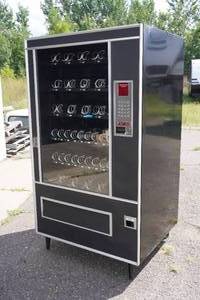 lot 1 image: Lektro Coin Operated Vending Machine Model VS99C