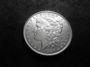lot 11 image: 1886 Morgan Silver Dollar