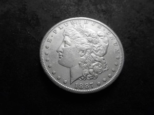 lot 13 image: 1887 S Morgan Silver Dollar