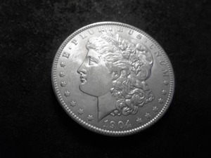 lot 30 image: 1904 O Morgan Silver Dollar