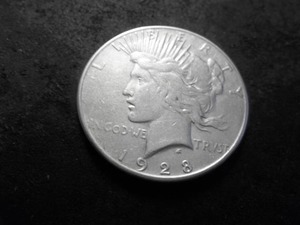 lot 38 image: 1928 S Peace Solver Dollar