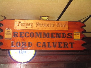 lot 5 image: Lord Calvert Ferney Farmers Bar Wood Sign 11x32
