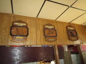 lot 17 image: (3) Lord Calvert South Dakota Wildlife Signs 16x23