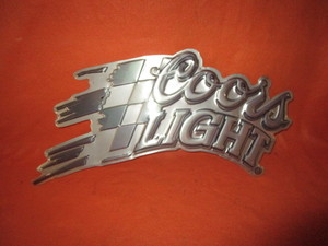 lot 46 image: Coors Light Checkered Flag Embossed Tin Sign 17x30