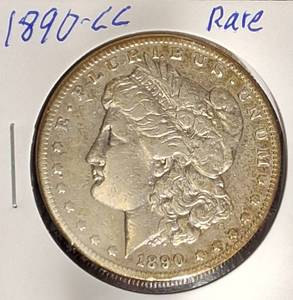 lot 3 image: 1890-CC Morgan Silver Dollar in nice condition. It is rare