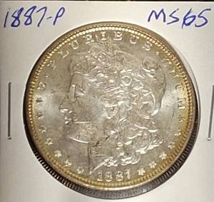 lot 14 image: 1887- P  Morgan Silver Dollar MS65