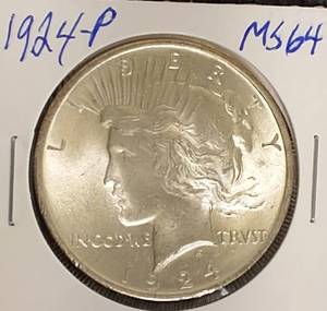 lot 24 image: 1924- P  Peace Silver Dollar MS64