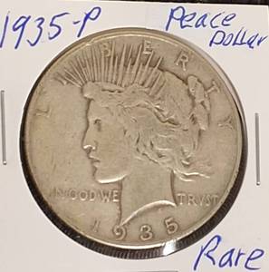 lot 26 image: 1935- P   Peace Silver Dollar