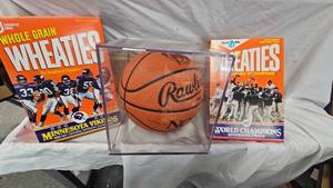 lot 40 image: 1997 Final Four Basketball from Indianapolis, 2 empty Wheaties Boxes, 87 Twins 92 Vikings