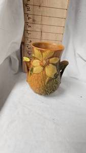 lot 64 image: Roseville Clematis Vase from the 40s