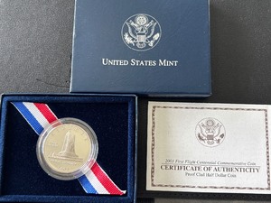 lot 32 image: 2003-P First Flight Half Dollar Proof