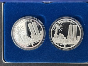lot 40 image: 2007 Freedom Tower Silver Dollars