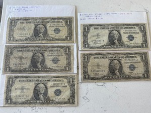lot 74 image: Blue Seal $1 Dollar Silver Certificates