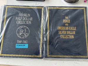 lot 196 image: Franklin Half Dollar and Peace and Silver Eagle Collector Books