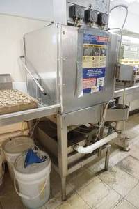 lot 23 image: Dish Machine, dish racks, chemicals, countertop