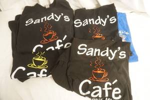 lot 185 image: Sandys Cafe Black T-Shirts 8ct (used, some have stains)