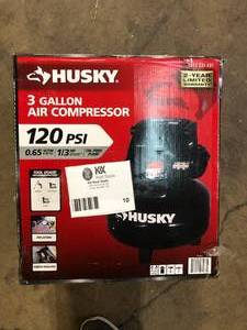lot 10 image: Husky 3 Gal. 120 PSI Portable Electric Oil-Free Light Duty Pancake Air Compressor with Fold Down Handle and 1-Quick Coupler    Customer Returns See Pictures