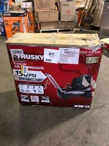 lot 19 image: Husky 8 Gal. 150 PSI Portable Electric Oil-Free Horizontal Hotdog Air Compressor with Rubber Wheels and 1-Quick Coupler Missing One Tire  Customer Returns See Pictures
