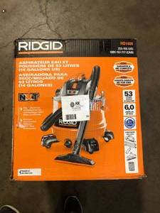 lot 55 image: RIDGID 14 Gal. 6.0 Peak HP NXT Shop Vacuum Wet Dry Vac with Fine Dust Filter, Locking Hose, Wands and Attachments HD1400    Customer Returns See Pictures