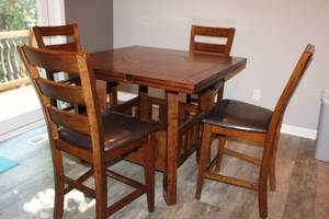 lot 1 image: Wood Counter-Height Dining Table with 4 Ladder Back Chairs