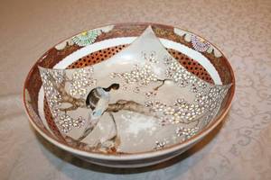 lot 14 image: Antique Japanese Porcelain Bowl with Bird and Blossom Motif