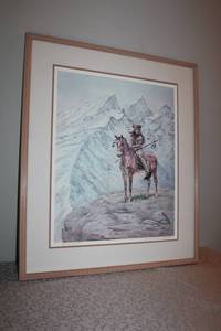 lot 23 image: Framed Print of Indian Scout on Horseback in Mountain Landscape