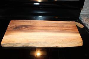 lot 48 image: Solid Wood Serving or Cutting Board with Natural Edge