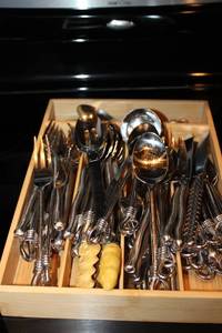 lot 52 image: Large Collection of Stainless Steel Flatware with Twisted Handles