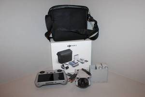 lot A-83 image: DJI Mini 3 Drone Fly More Combo with Remote, Batteries, and Carry Bag
