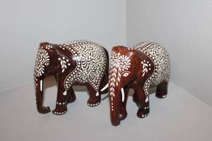 lot 88 image: Pair of Hand-Carved Wooden Elephant Figurines with White Inlay