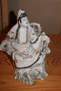 lot 178 image: Porcelain Figurine of Seated Woman in Robe with Floral Detail