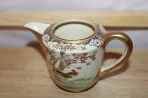 lot 200 image: Antique Hand-Painted Porcelain Creamer with Gold Accents