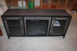 lot 217 image: TV Console with Built-In Electric Fireplace and Mesh Cabinet Doors