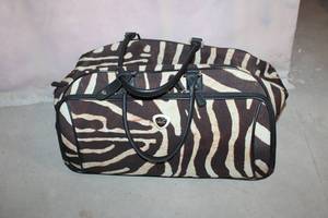 lot 232 image: Zebra Print Rolling Duffel Bag with Handles