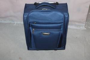 lot 238 image: Ricardo Rolling Carry-On Luggage in Blue